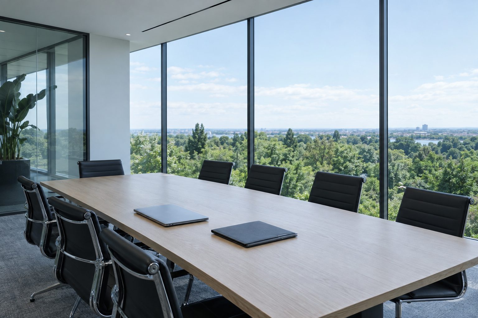 Empty conference room with glass walls prepared for a confidential meeting